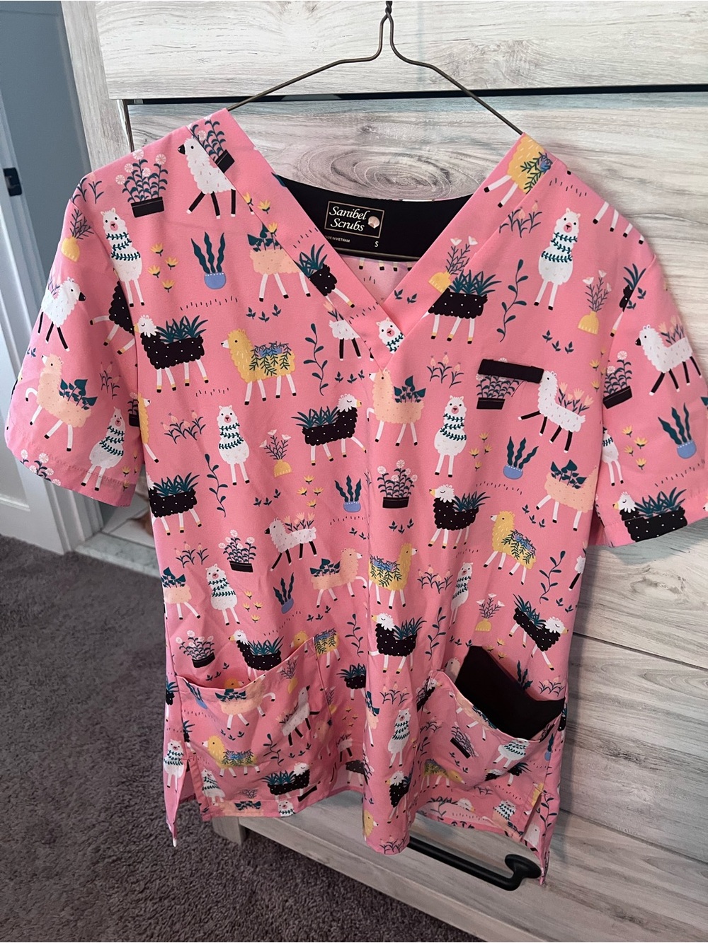 Sanibel Scrubs Women’s Pink Llama Print V-Neck Top